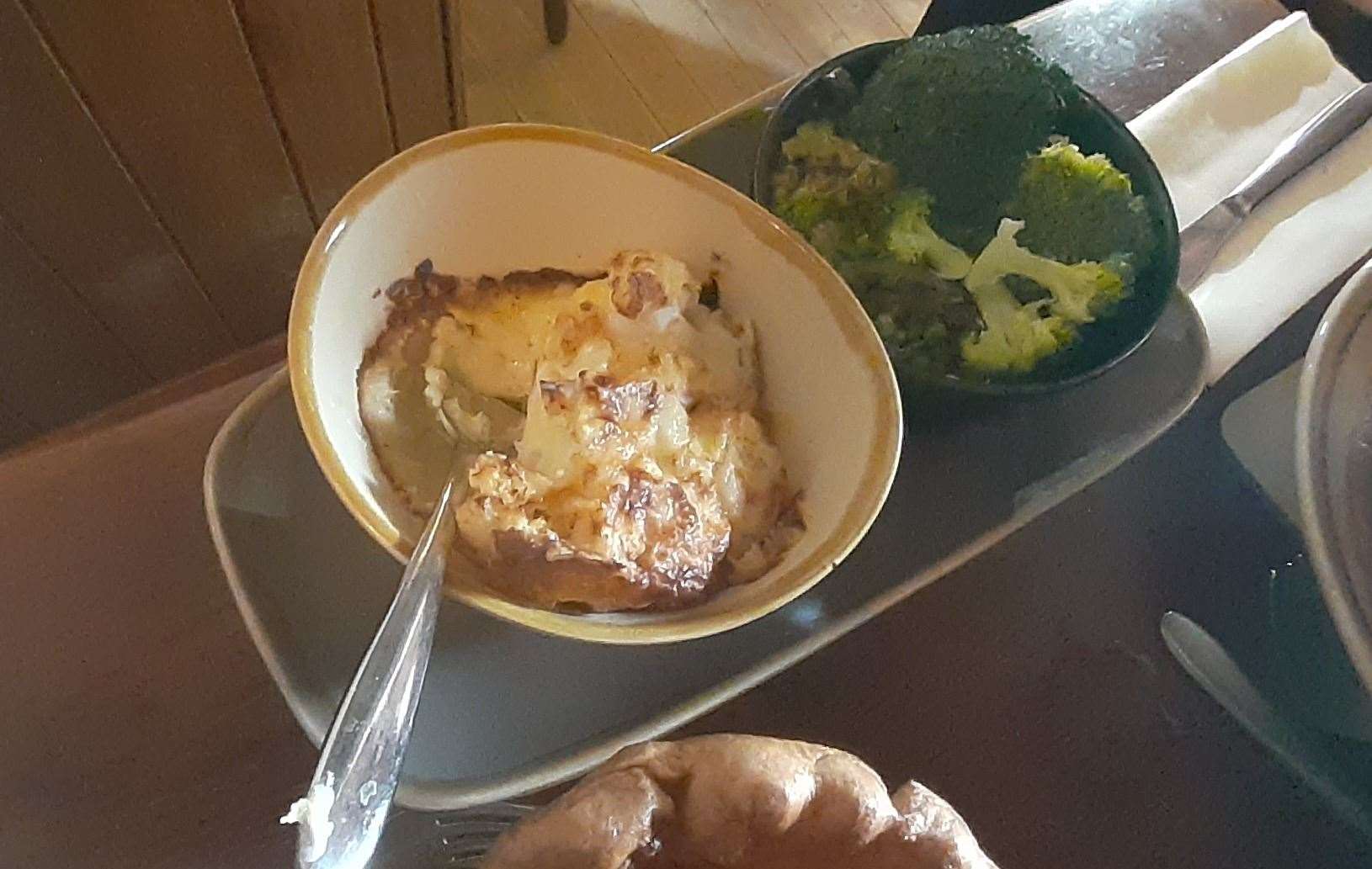 The Sunday lunch was accompanied by generous portions of cauliflower cheese and broccoli